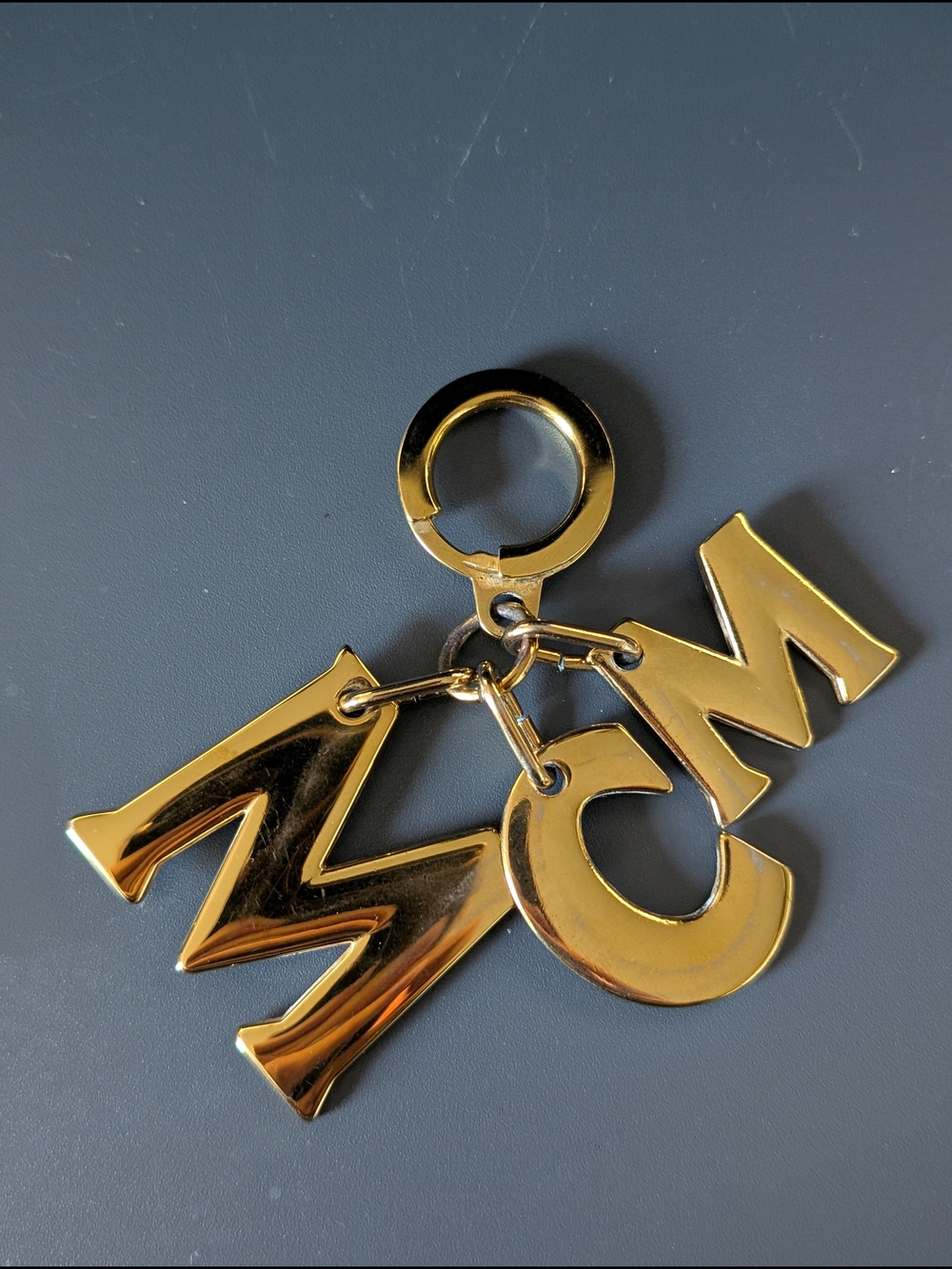 MCM Gold Tone Logo Letter Keychain Charm